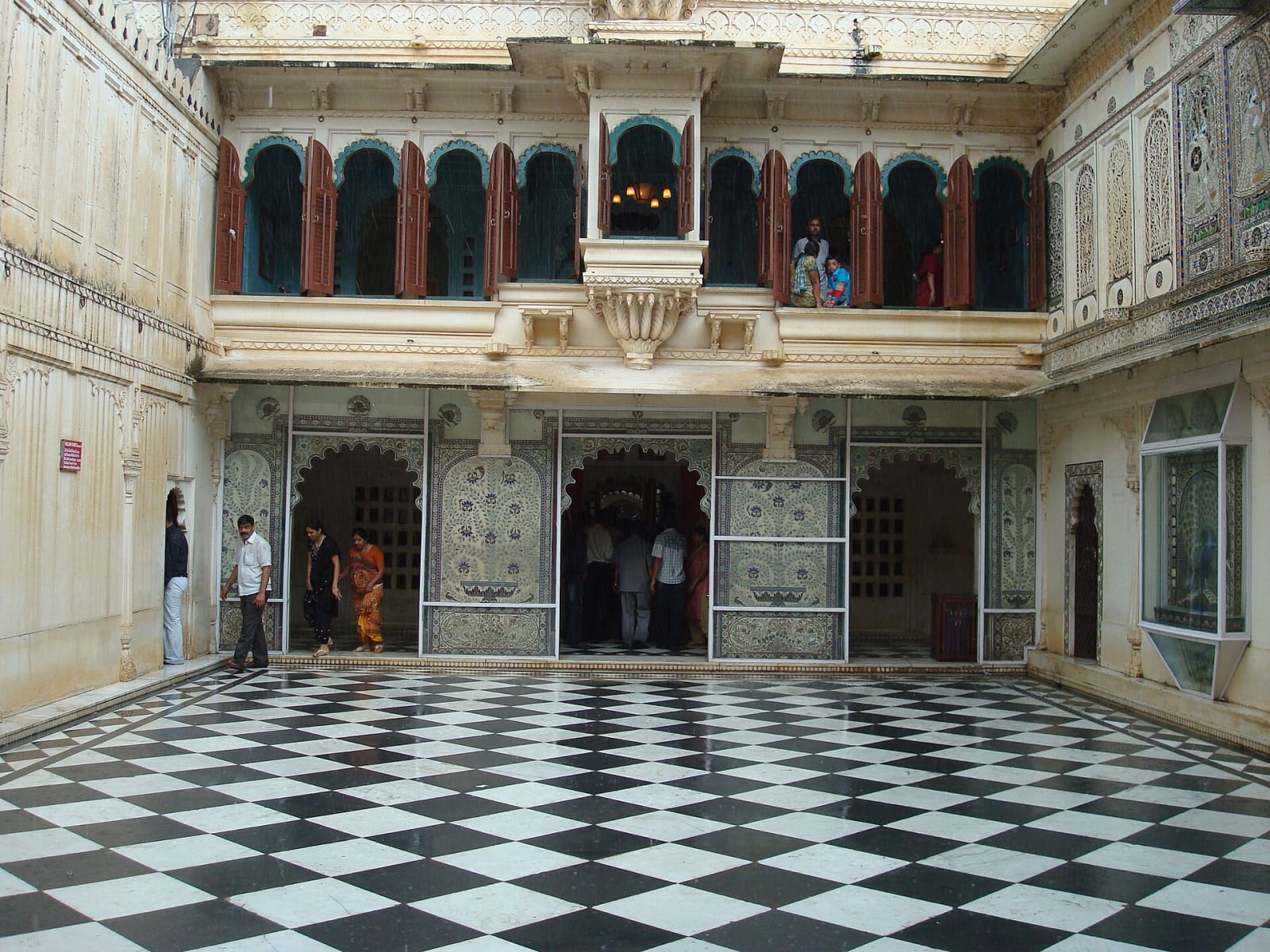 The chessboard-floored Mor Chowk courtyard in the City Palace, Udaipur