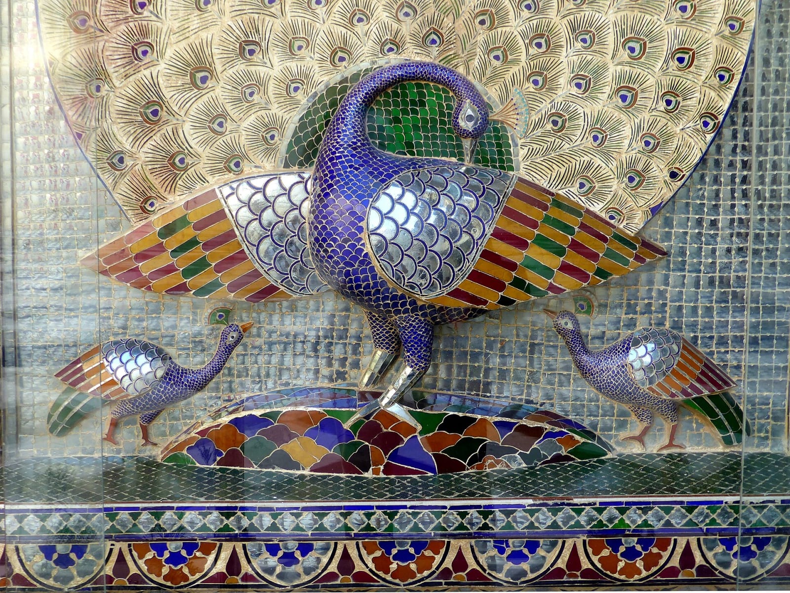 A glass-mosaic peacock on the wall of Mor Chowk, City Palace, Udaipur