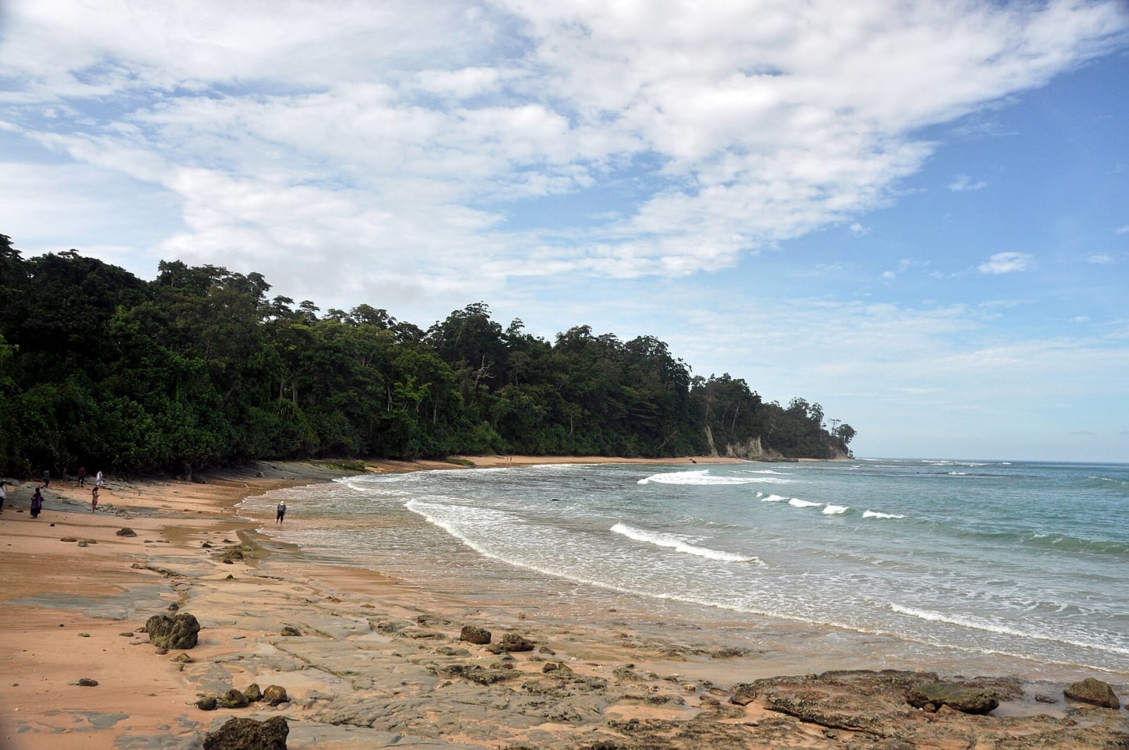 The curve of Sitapur Beach and its forested headland on Neil Island