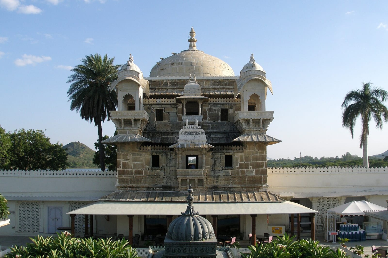 The Jag Mandir island palace on Lake Pichola with a domed pavilion and palms