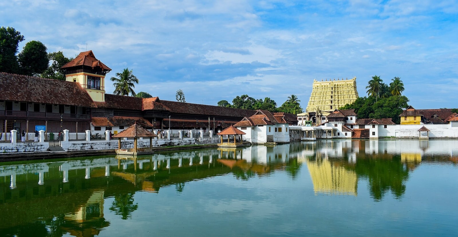 Temple tank at Padmanabhaswamy Temple, Thiruvananthapuram, with the gopuram in the distance