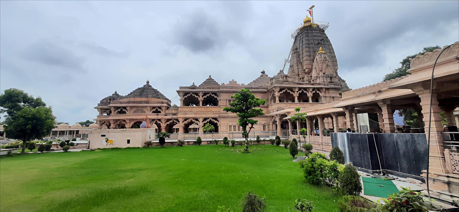 Sawariya Seth temple at Mandphiya, Rajasthan, seen from the garden under a cloudy sky