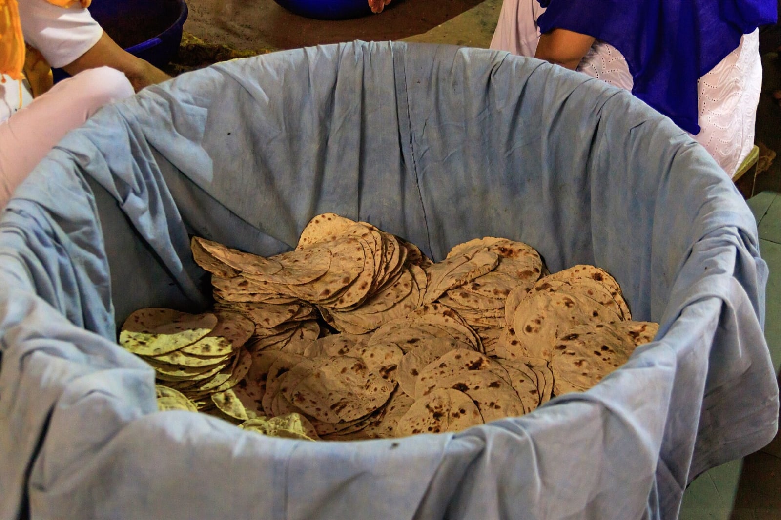 A basket of freshly made rotis at the community kitchen of Gurudwara Bangla Sahib