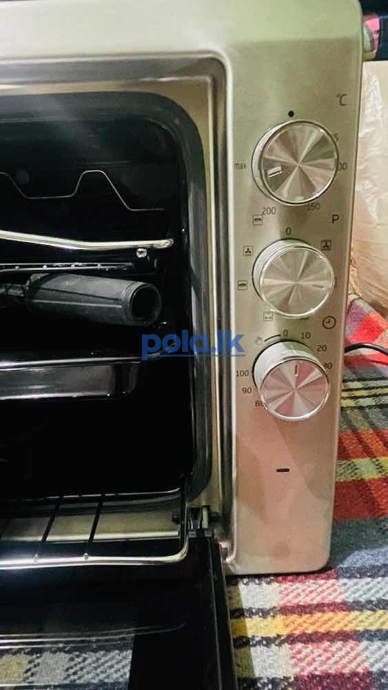 Brand new singer electric oven - photo 1