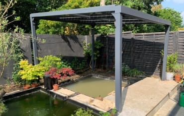 T & S - Semi-Transparent Solar Glass Canopy over a patio area