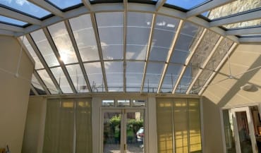 DC - Domestic Conservatory incorporating transparent solar glass and a battery storage system