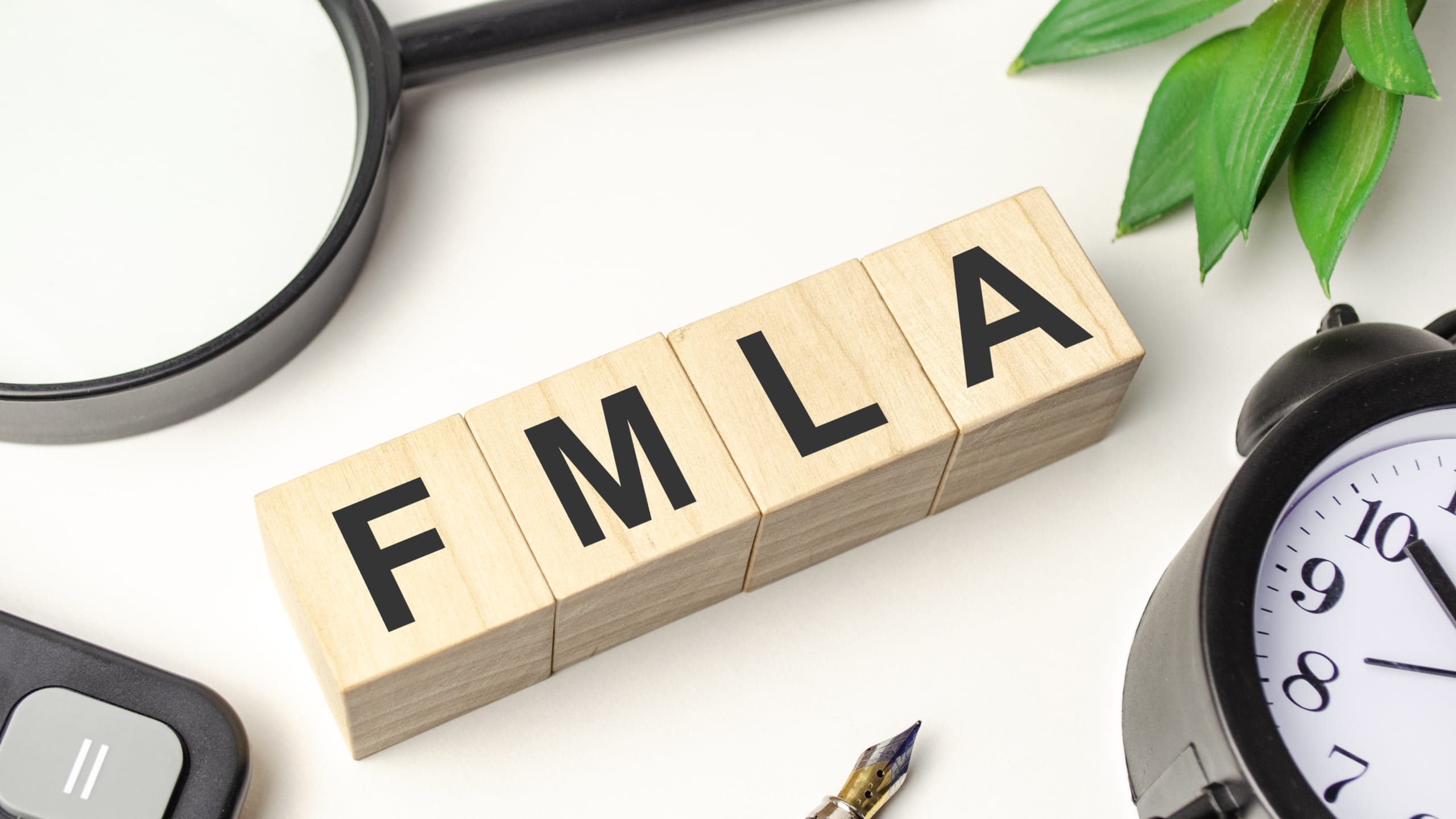FMLA In Blocks On A Desk fmla-in-blocks-on-a-desk