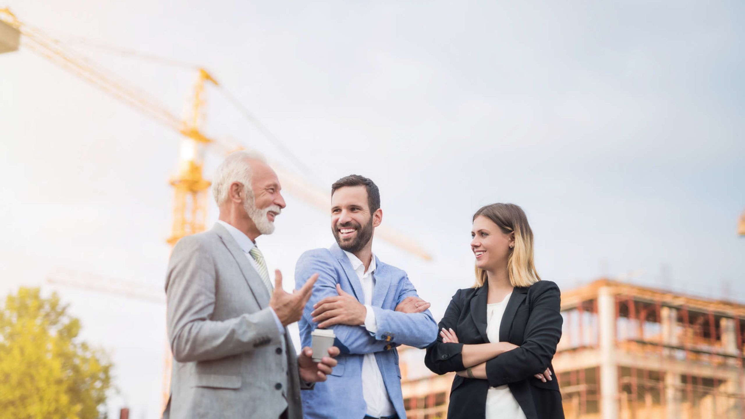 investors in a conversation at a construction site