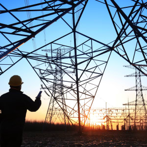 high power lines at sunset