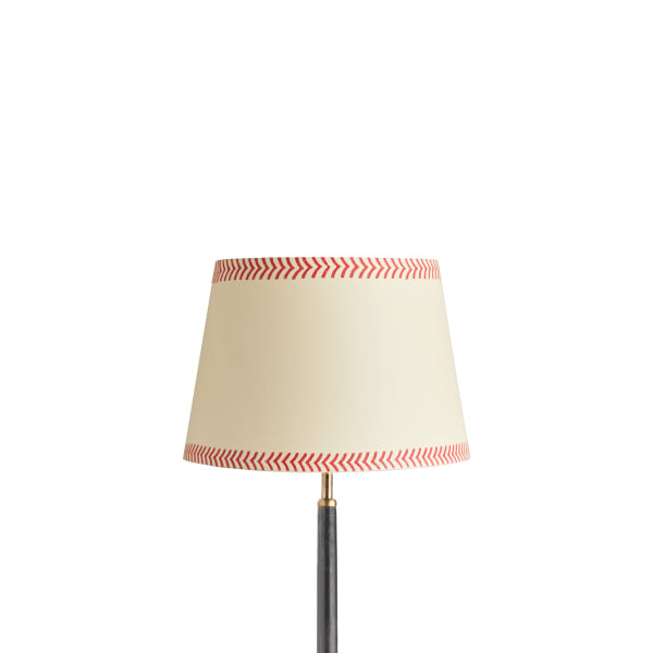 Galore floor lamp in brass with a black shade