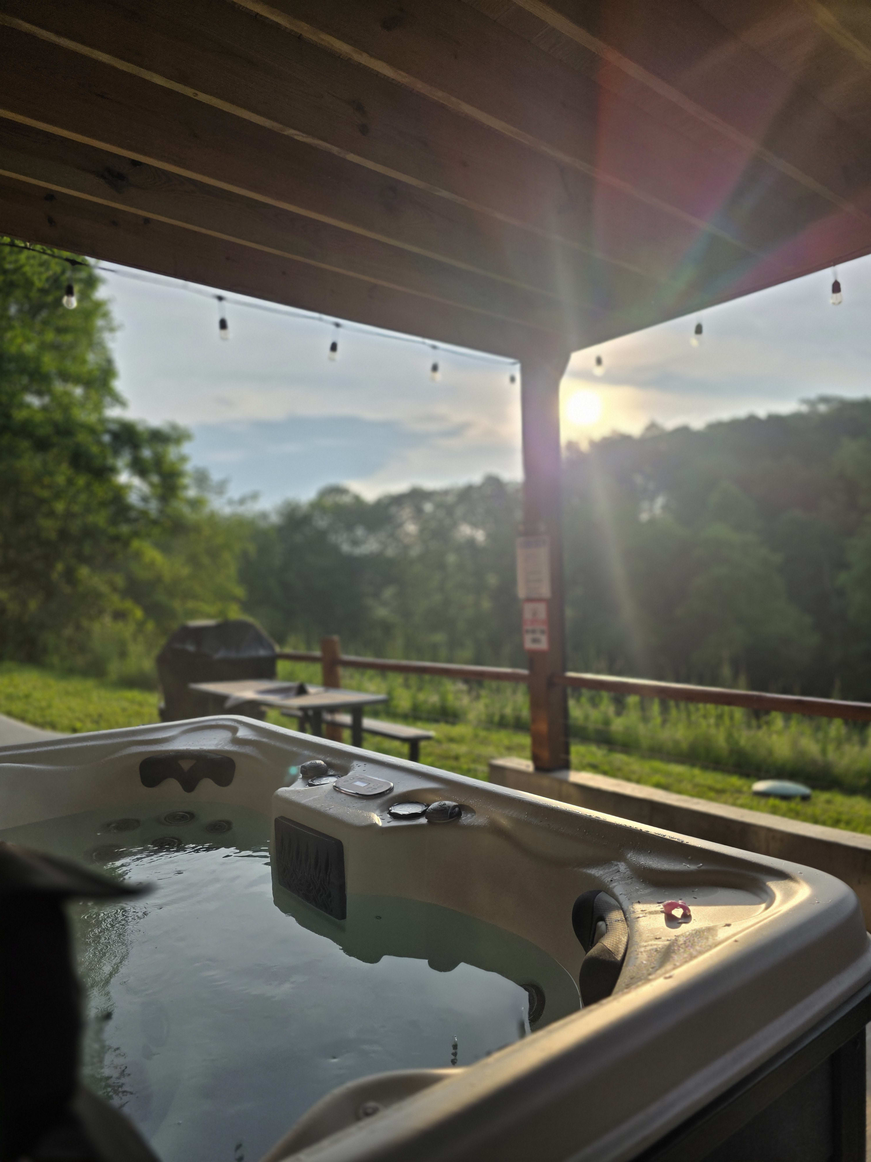 Private outdoor hot tub at Pool House Lodge, Hocking Hills Ohio