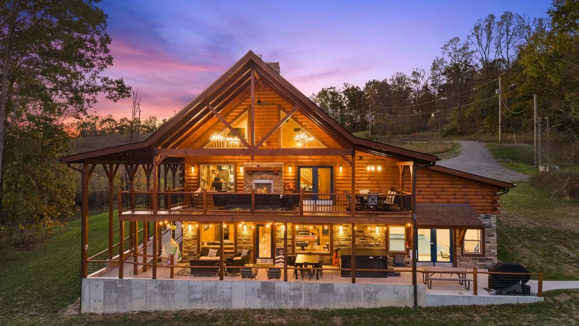 Pool House Lodge covered porches at dusk