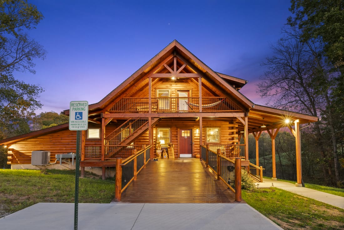 Pool House Lodge exterior at twilight