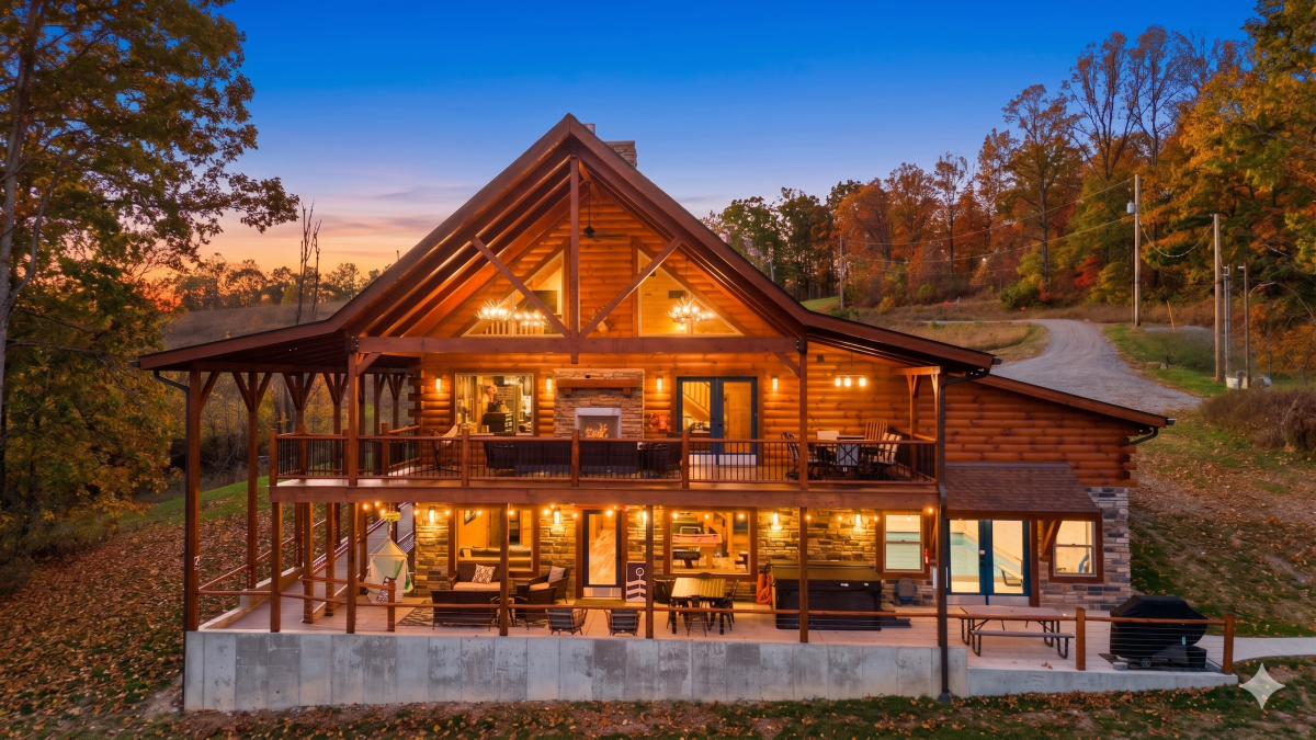 Pool House Lodge at dusk — private cabin resort in Hocking Hills Ohio