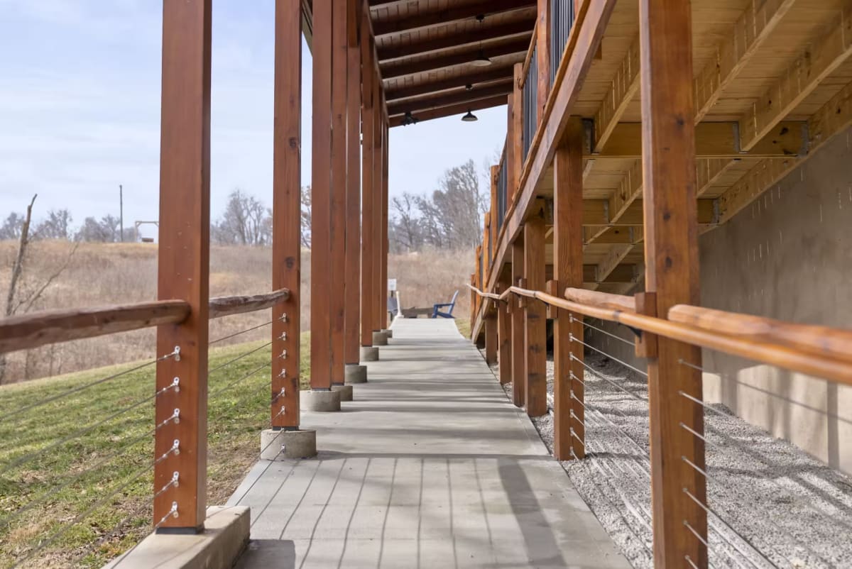 Wheelchair accessible walkway leading to the indoor pool building at Pool House Lodge — Hocking Hills Ohio
