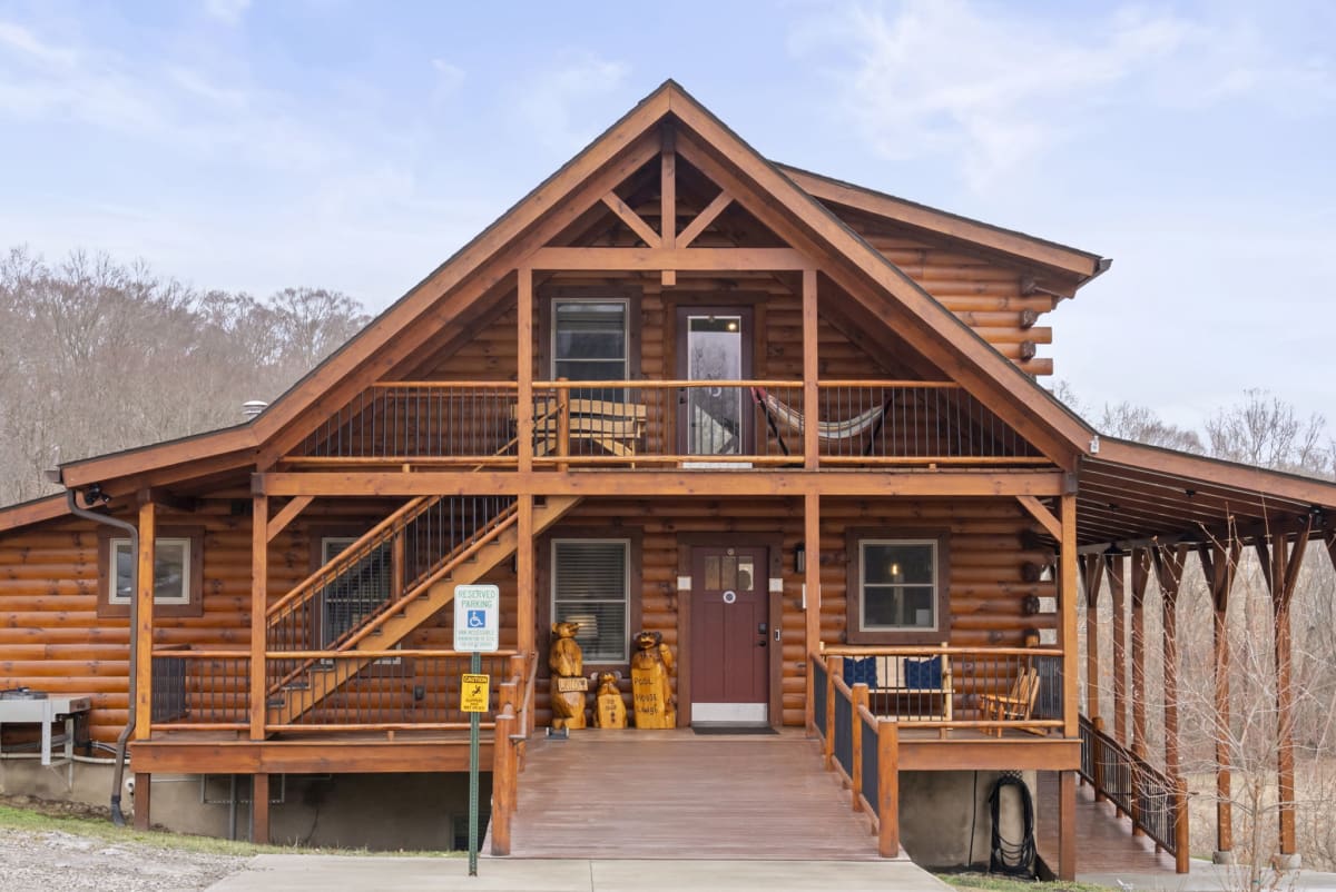 Pool House Lodge exterior showing accessible ramp at the front entrance — Hocking Hills Ohio