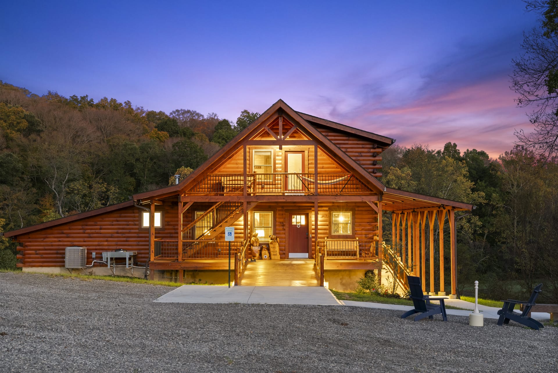 Pool House Lodge exterior at dusk