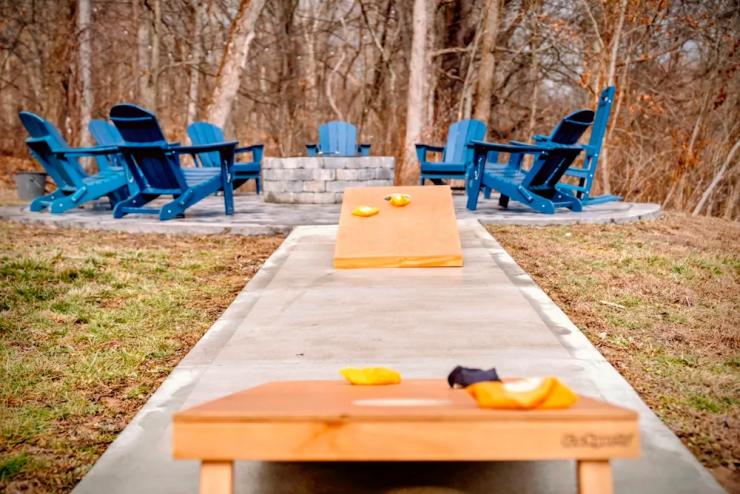 Cornhole by the fire pit at Pool House Lodge