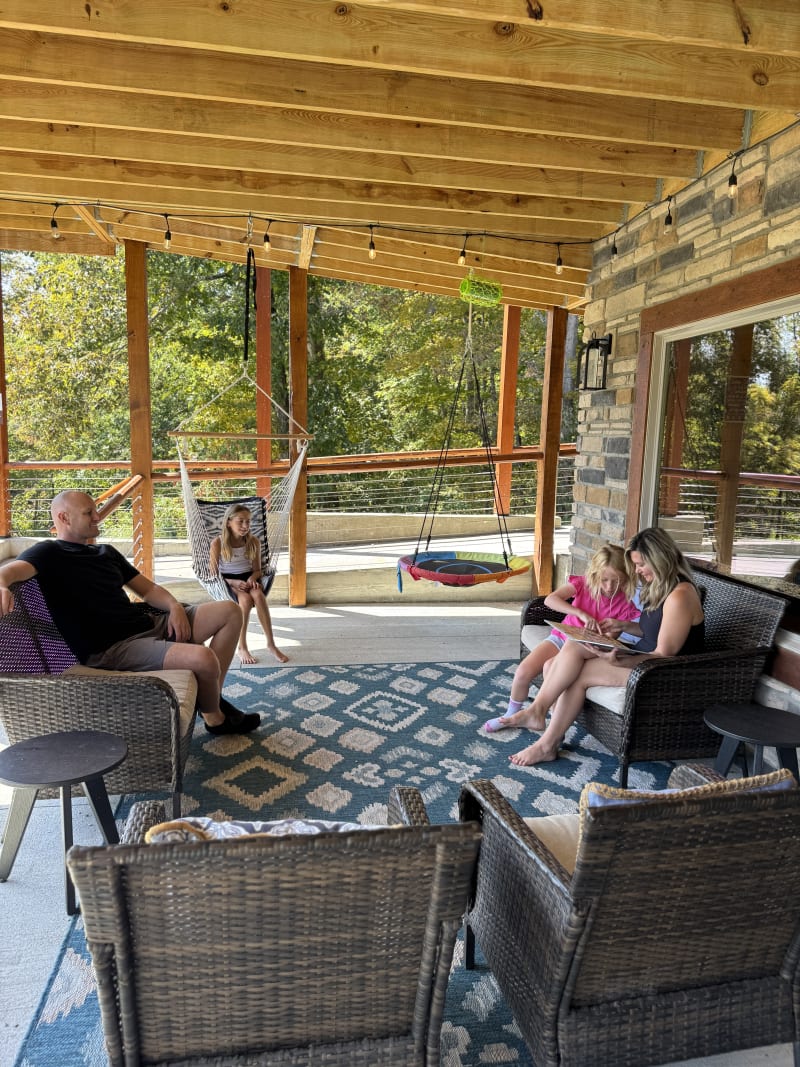 Pool house family on back porch