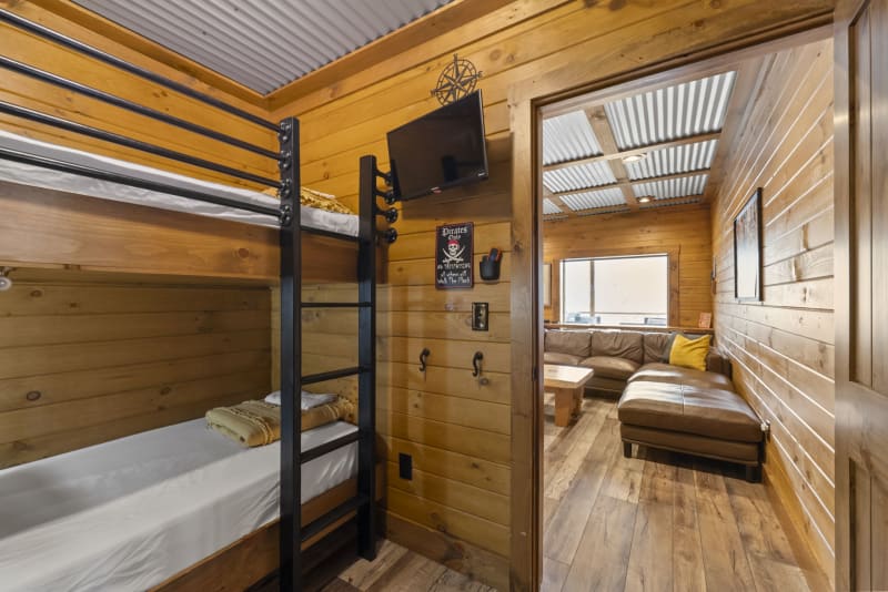 Pool house lodge bedroom5 pirate bunk room tv living area view
