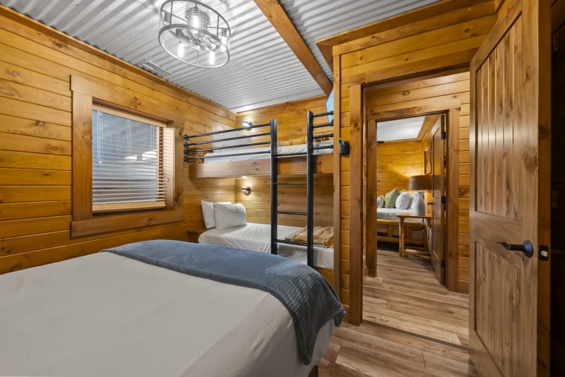 Pool house lodge bedroom6 twin bunk adjacent room view