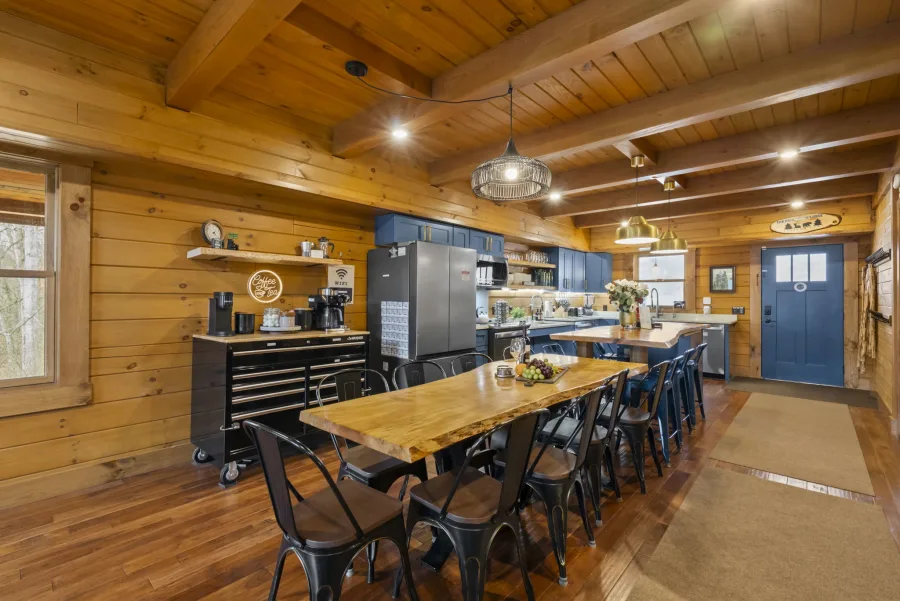 Chef's kitchen and dining space at Pool House Lodge — seats 20