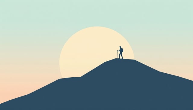 Silhouette of a person on a hill against a huge setting sun