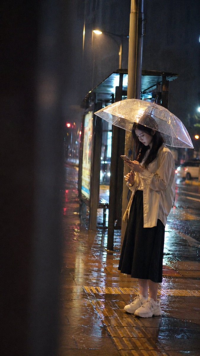 Cinematic rainy night bus stop prompt AI image template preview