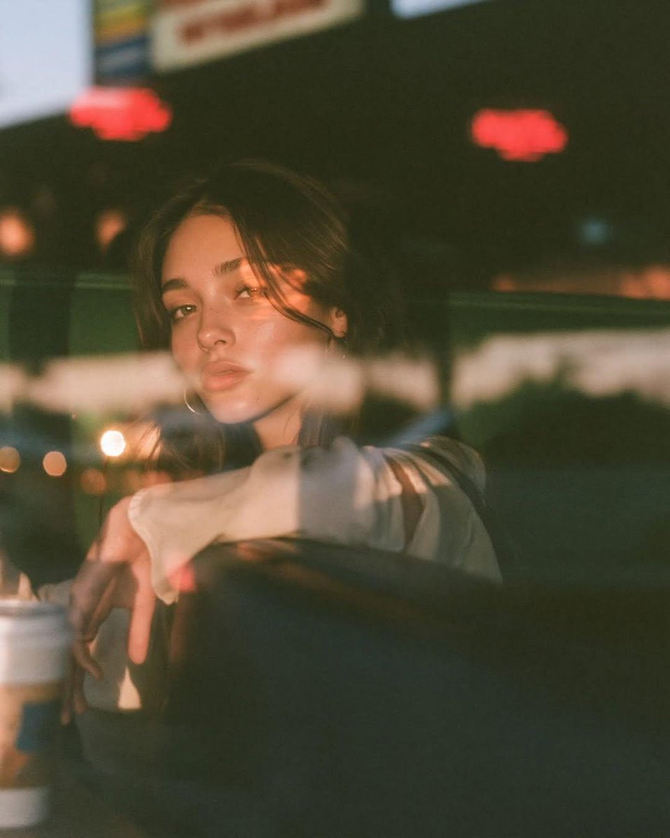 Cinematic Café Portrait at Blue Hour example 1