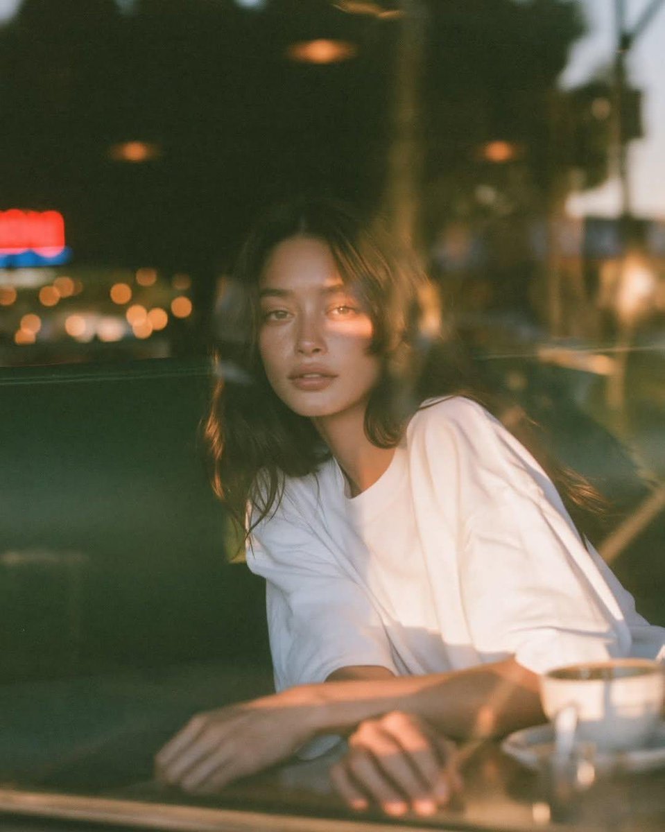 Cinematic Café Portrait at Blue Hour example 3