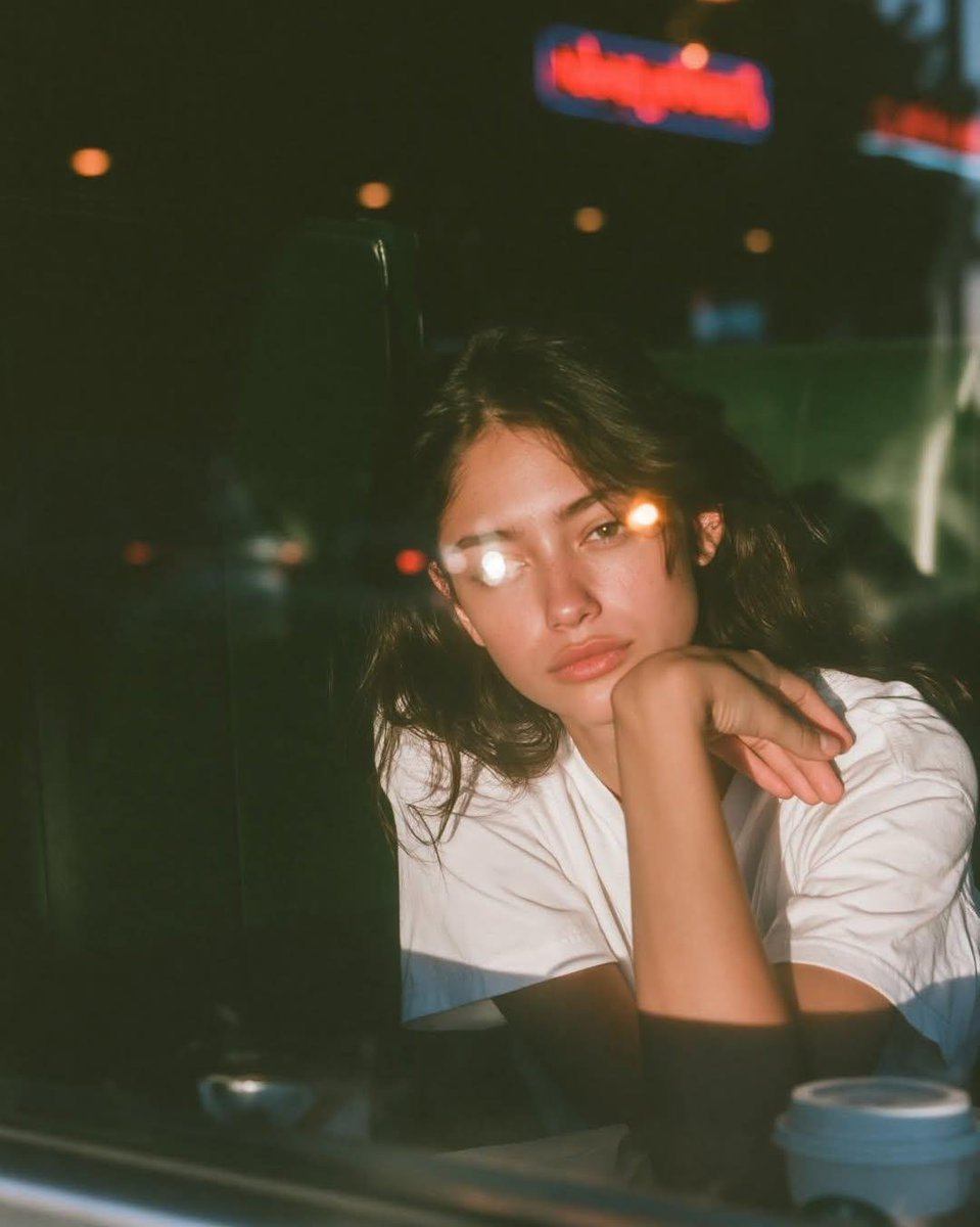 Cinematic Café Portrait at Blue Hour example 4