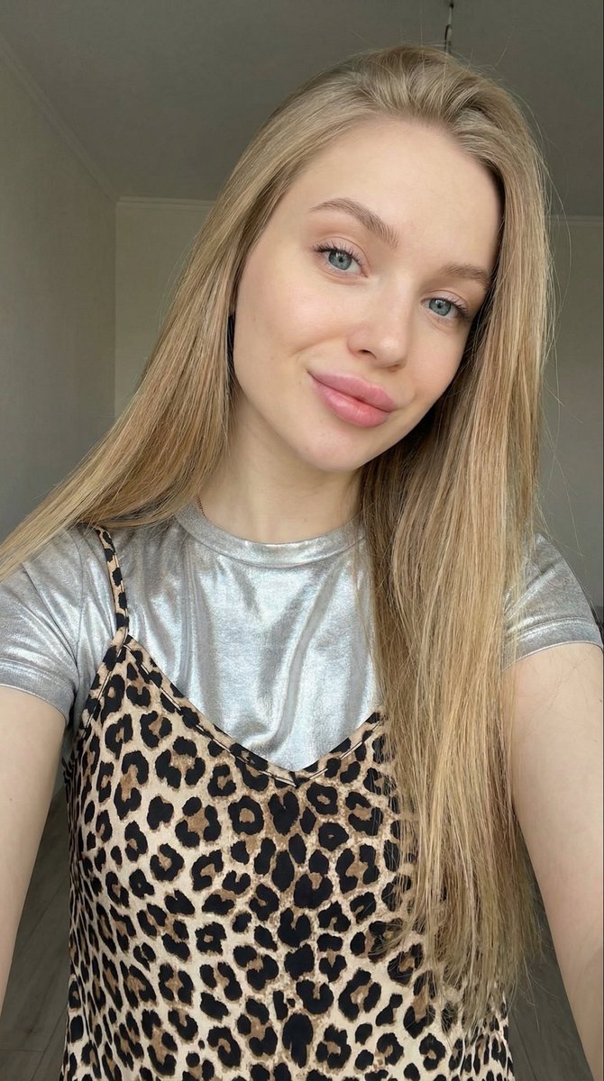 Close-up Selfie of a Young Woman with Leopard Print Top AI image template preview