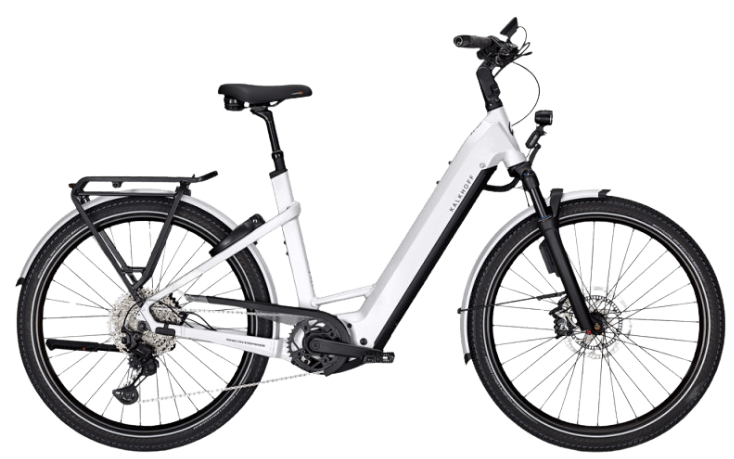 A white electric bicycle with black accents, featuring a step-through frame, front and rear racks, and disc brakes.