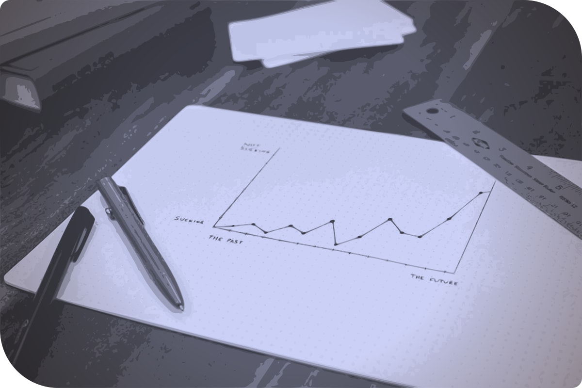Un cuadro de notas con un lápiz y un círculo de medidas.