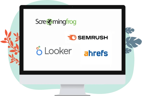 La pantalla de un ordenador muestra los logotipos de Looker, Ahrefs y Semrush.