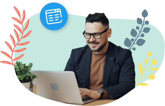 Un hombre con gafas y un traje negro está trabajando en su computadora.