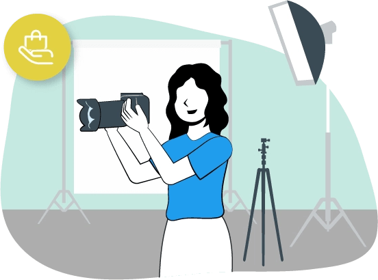 Una mujer toma una foto con su cámara en una sala de proyecciones.