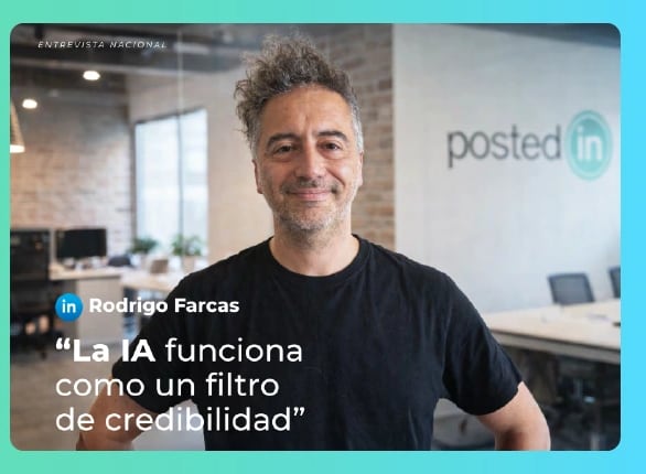 Rodrigo Farcas, a man with a beard, is posing for a picture in front of a brick wall.