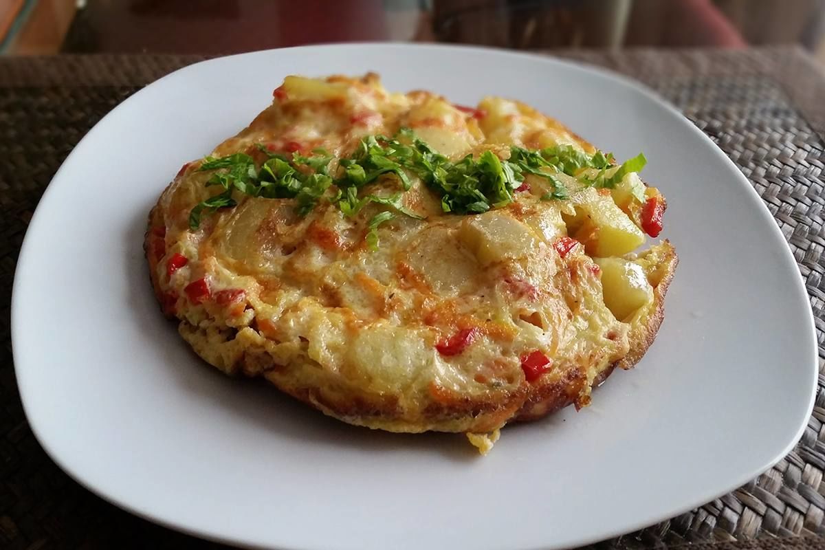 Cocinar tortilla de papas con zapallo italiano cookcina