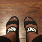 nike tanjun sandals on feet