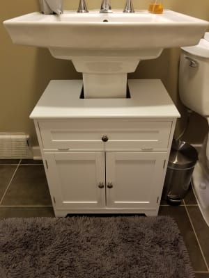 The Pedestal Sink Storage Cabinet Hammacher Schlemmer