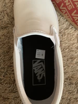 tumble white slip on vans