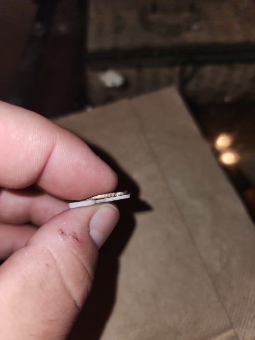 Garbage. No edge at all. Flat on both sides