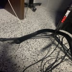 Guitars want to slide on material used on bottom holder.