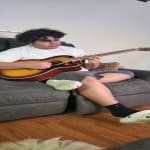 My son loves his guitar