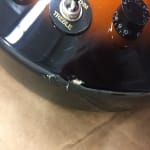 Has that great Les Paul look, but plays like a cheapo