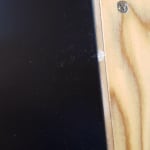 Item had scratches, chips in the lacquer and corner damage.