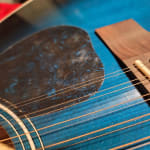 bowed neck and rusty strings on NEW guitar