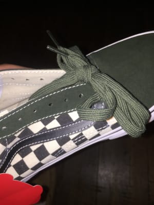 olive green checkered slip on vans