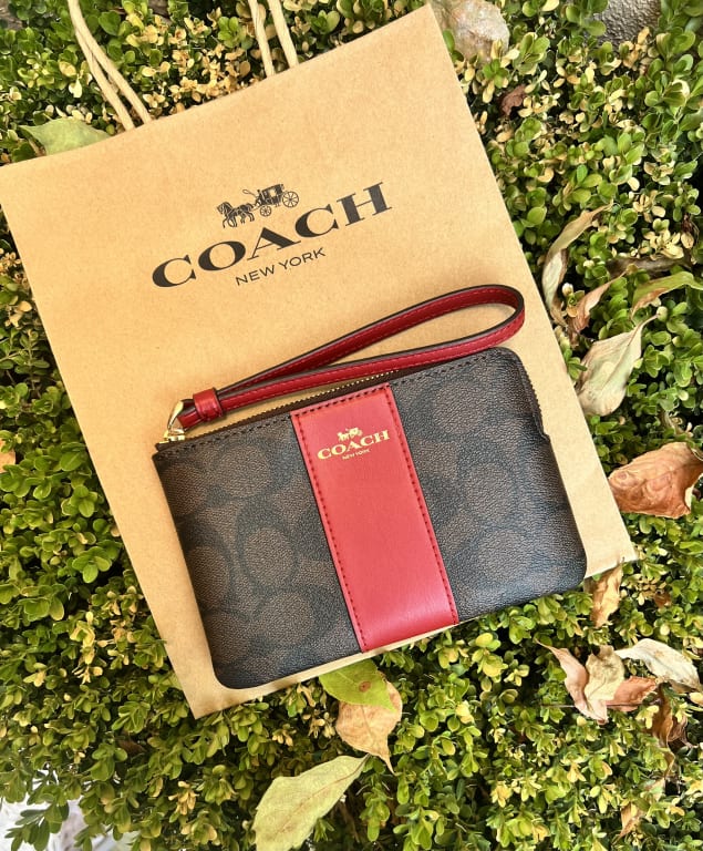 I'm a shopping editor and I'm buying this $23 Coach Outlet wristlet for  Christmas